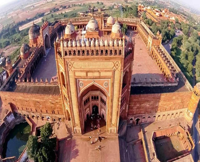 From Delhi: Taj Mahal Sunrise, Agra Fort & Baby Taj Day Tour - Baby Taj optional stop: calmer marble work