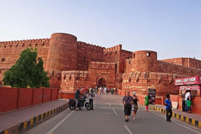 From Delhi: Taj Mahal Sunrise Tour with Elephant SOS Center - Agra Fort in 90 minutes: Mughal power in red sandstone scale