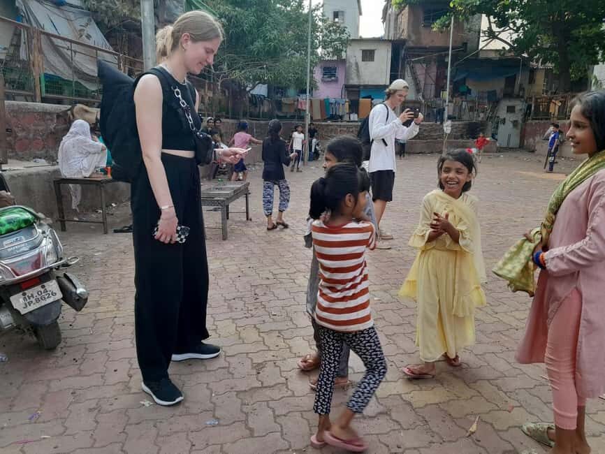 Mumbai: 2 hours Dharavi Slum Tour with Local Guide - Meeting point, walking rules, and what to bring in Mumbai heat
