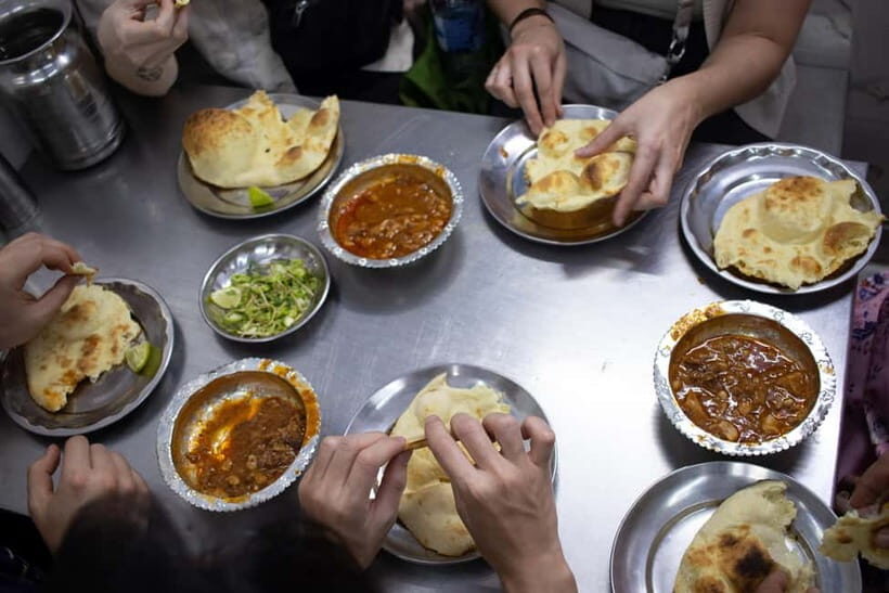 Old Delhi Food Tour: A Night Time Feast - Meet Faizy at Lal Quila Metro Gate No. 1 and Get Settled Fast