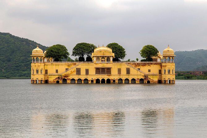 Private Full Day Jaipur Tour with Guide - City Palace and Jal Mahal: royalty, real rooms, and a watery photo pause